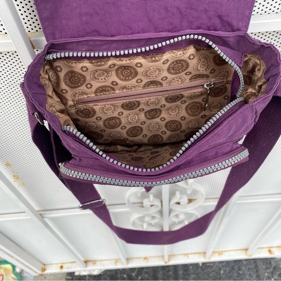 Jinqiaoer Small 8”X8” purple Nylon Crossbody purse. Lots of storage zip pockets - Picture 4 of 6